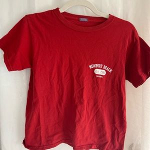 red brandy melville t-shirt , no stains and color is vibrant!